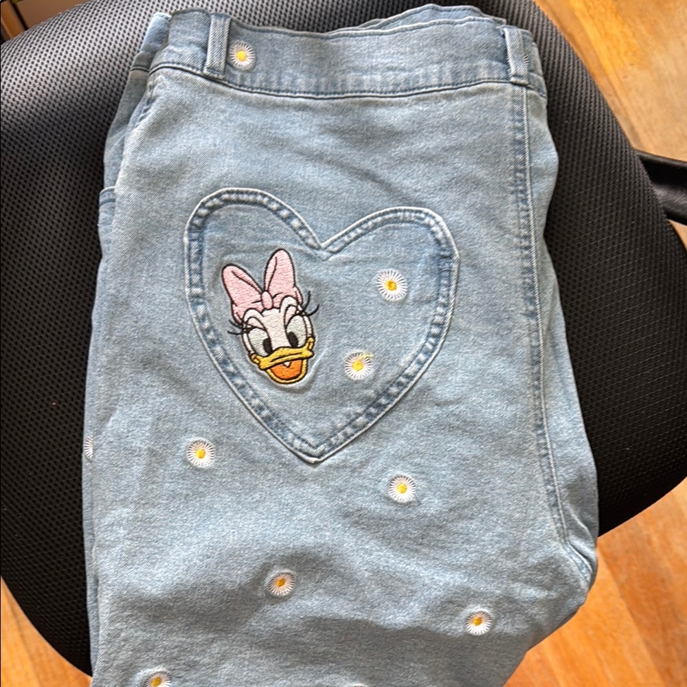 Disney cakeworthy Jean Shorts with Daisy Duck on the back heart pocket